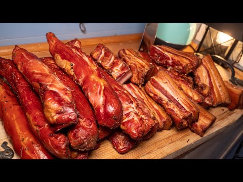 Curing and hot smoking. Smoking duck breast, bacon, and pork fillet with a Batavia smoker.