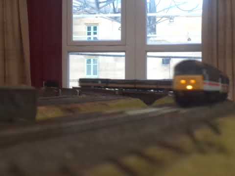 The BACHMANN is, BR Class 47 InterCity Swallow No.47828 was running on OO Gauge Layout. (V8/END)