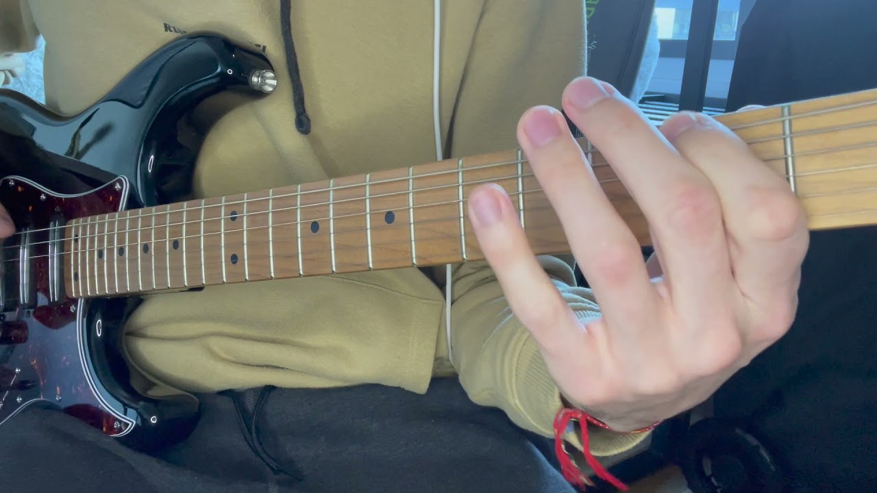 Roberto Barlocci playing the main riff of Kansas' Carry On Wayward Son on electric guitar.