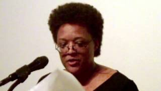 Robin Small-McCarthy reads a poem to her students