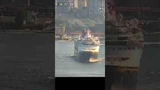 Helicopter overtakes departing cruise ship in Vancouver