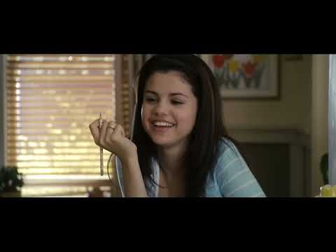 Trailer end card — confetti smile, handing off to Selena Gomez & the Scene’s end-credit single