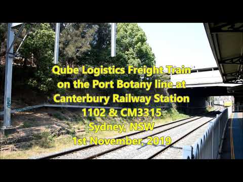 Qube Logistics Freight Train on the Port Botany Line at Canterbury Railway Station 1102 and CM3315