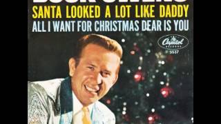 Buck Owens – “Santa Looked A Lot Like Daddy” (Capitol) 1965