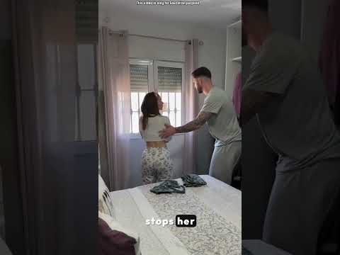 girl is taking off her clothes in front of an open door 🚪