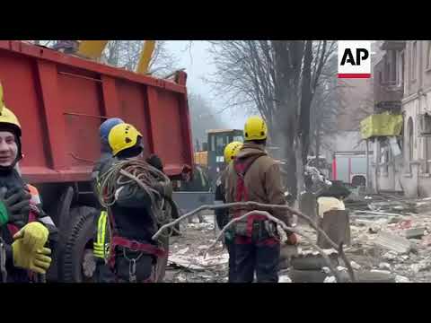 Emergency teams attend strike-hit building in Kryvyi Rih