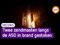 Twee zendmasten langs de A50 in brand gestoken