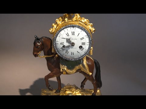 Gilt and Lacquered Bronze Clock “The Trotting Horse”, François VION Transition period