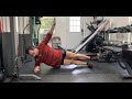 Side plank crunch with leg arm raised