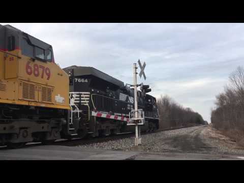 Ns ES44DC loco leads ns 22k out of siding W/up trailing with bell left on !