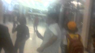 young nucho bombarded by fans while shopping at sandton mall again mistaken for lil wayne.flv