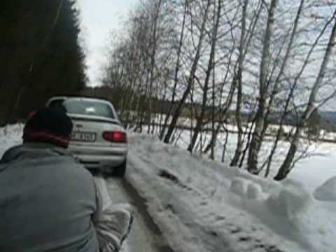 Autoskijöring with sledges on road - Autoskijöring se sáňkama na silnici