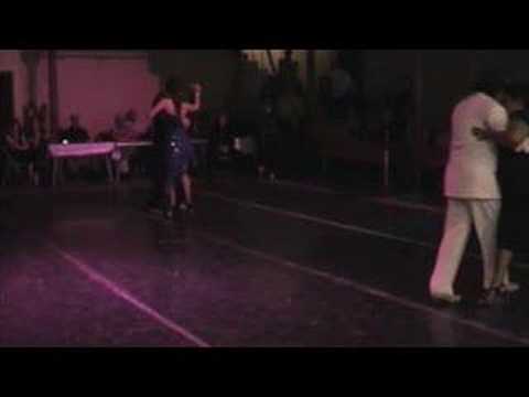  Stefano Fava,    María del Carmen Romero,    Jorge Dispari,    and  Alexandra Wood  are  dancing  to  the  milonga  "  No Hay Tierra Como La Mia  "