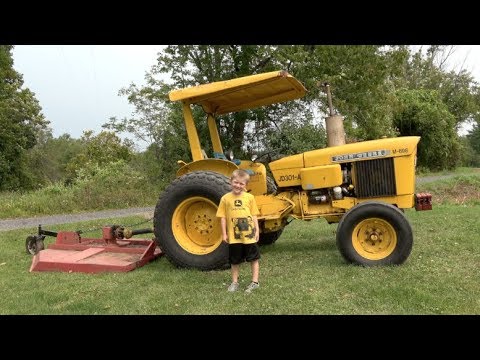 THE TRACTOR TRACKER - YELLOW JOHN DEERE TRACTOR