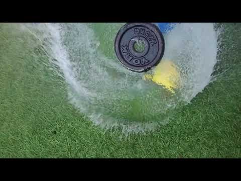 Slow motion giant water balloon popping
