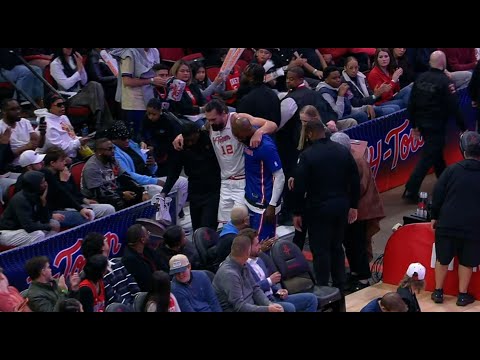 Steven Adams gets injured upon landing and is helped to the locker room