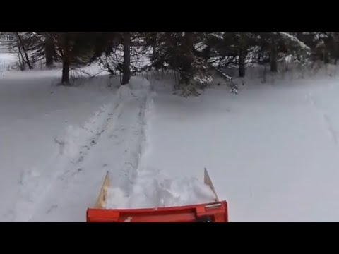 This is the best way to use your bucket for snow Plowing | Kubota Bx2380