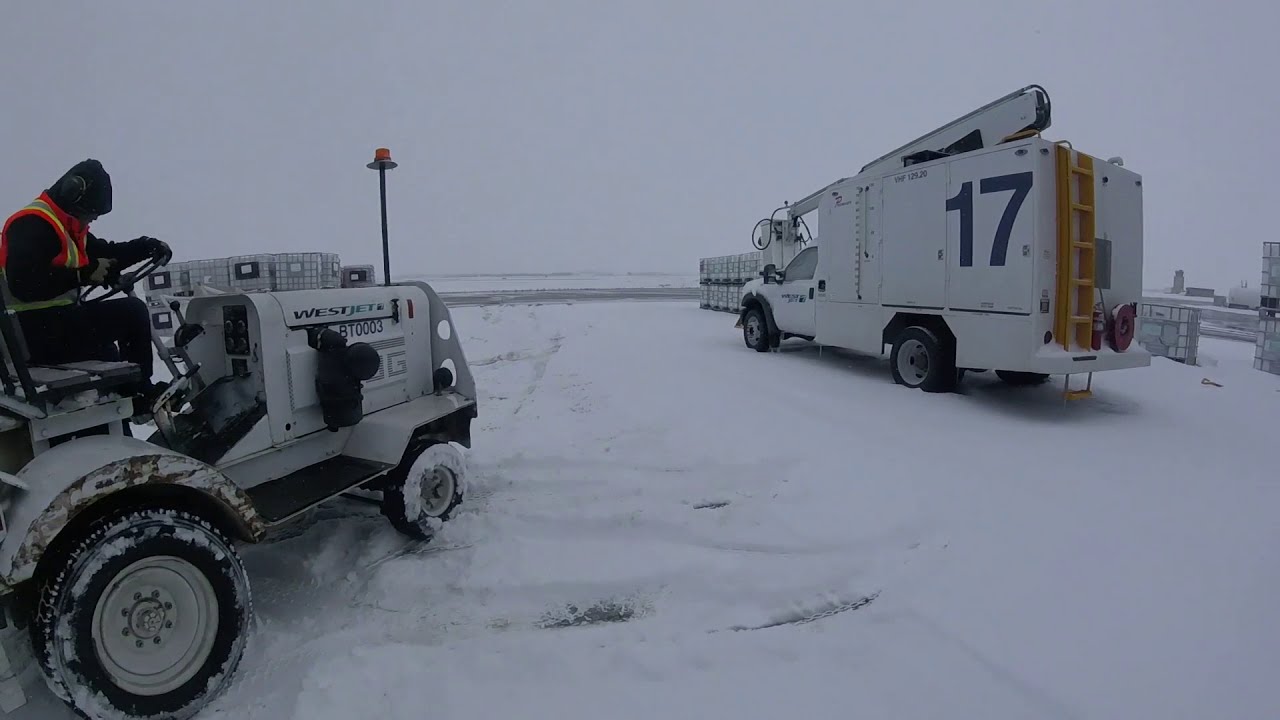 WORKING AT AN AIRPORT IN A SNOW STORM !!!