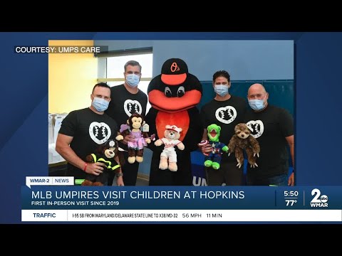 MLB umpires with UMPS CARE visit kids at Johns Hopkins Children's Center