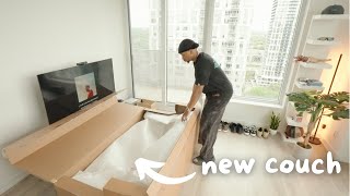 Setting up my new couch in my Toronto Apartment