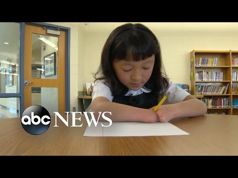 10-year-old girl born with no hands wins national handwriting competition