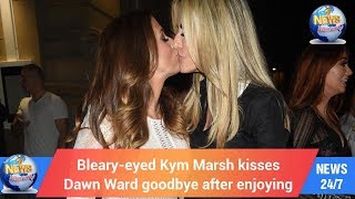 Today's World: Bleary-eyed Kym Marsh kisses Dawn Ward goodbye after enjoying