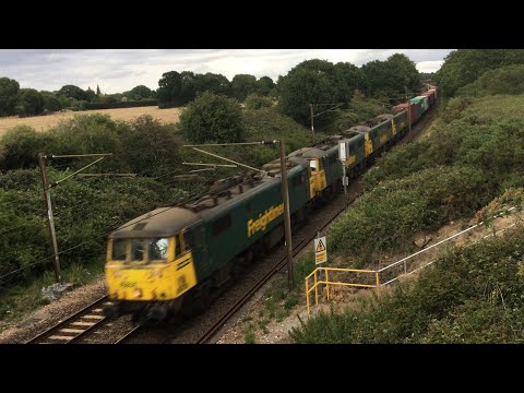 Freightliner 86608, 86632, 86628 and 86609 convey 4S88 under Shaws Farm