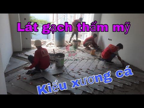 Lát gạch nền nhà phố chất lượng, lát gạch vân gỗ nhập từ Ý kiểu xương cá -AN LẠC VIỆT xây dựng Tổ ấm