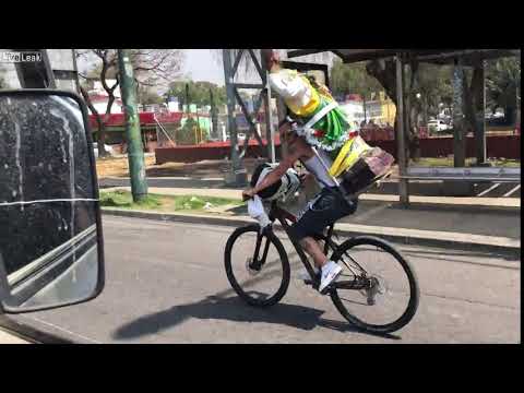 Guy carrying Jesus statue distracted