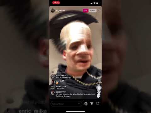 LX pisst gegen Polizeiwagen