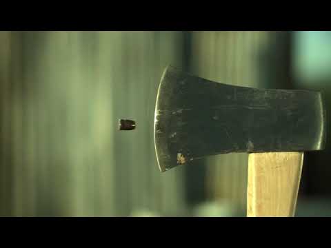 Axe cutting Bullet in Half !
