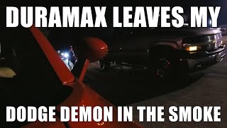 Duramax Leaves Dodge Demon In Smoke at drag strip