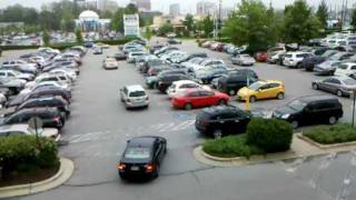 preview picture of video 'Watching parking lot traffic at Montrose Crossing shopping center in Rockville, Maryland (2 of 2)'