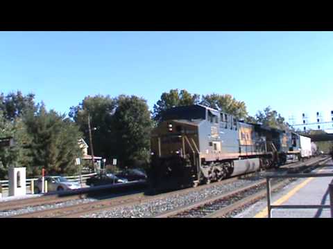 CSX 573 AND 11 PULL 2 CARS AT ST DENIS
