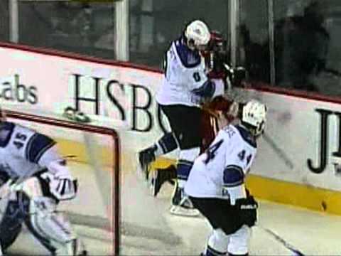 Drew Doughty checks Brendan Morrison