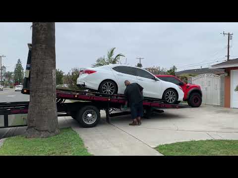How to operate a flatbed tow truck, stuck in park for whatever reason,don’t drag it ,walk it …