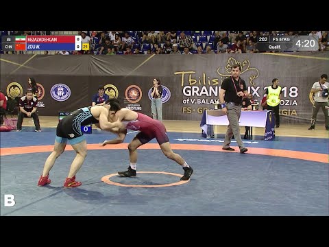 Qual. FS - 57 kg: M. REZAZADEHGAN (IRI) v. W. ZOU (CHN)
