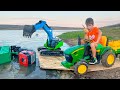 Darius riding his tractor in the mud and saving some car drivers from water | Kids Adventure