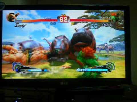 SF4 AE @ Oktoberfist 2011 - Gigas (Zangief) vs Jake (Blanka) 01