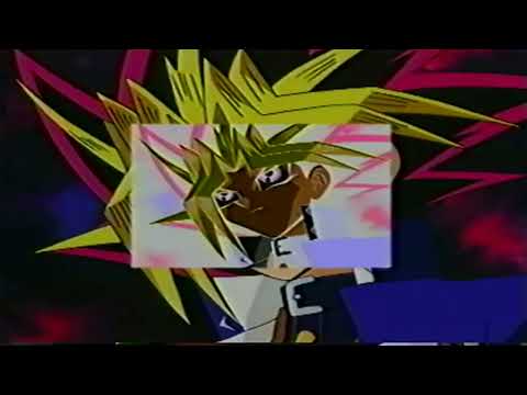 Promo montage: duel disks activate, Blue-Eyes White Dragon roars as track titles flash
