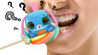 Süßes Lollipets-Spielzeug: Auspacken und füttern