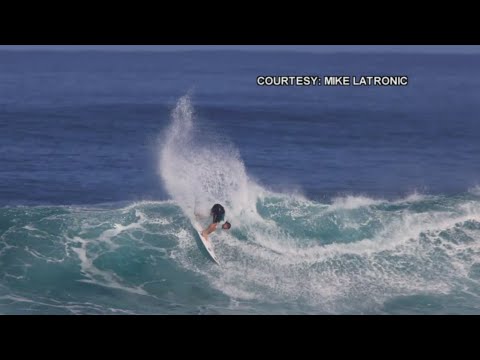 Deivid serving up a backside hack at Sunset Beach