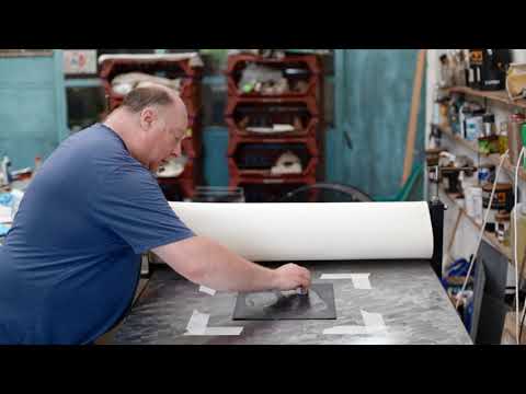 Welsh artist Mark Lloyd Williams making an etching print