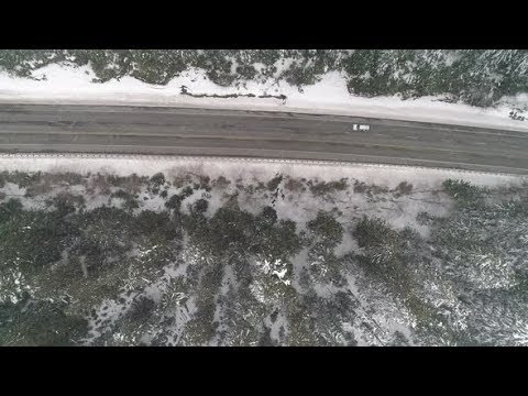 Driving Snowy Mountain Road Snowfall Danger Aerial | Stock Footage - Videohive