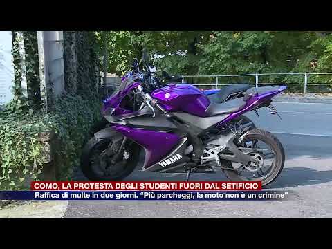 Etg - Como, students protest outside the Silk Factory. "More parking, motorcycles aren't a crime."