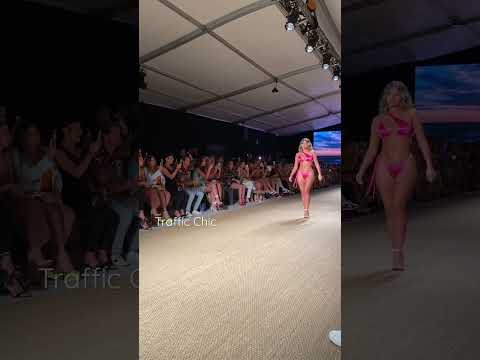 Sofia Jamora opening the Abyss by Abby runway show with a sexy and modern hot pink bikini