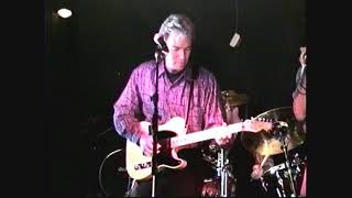 Delbert Veo Band doing a tune at OMalleys in Charlotte, N.C. on February 12, 1995.