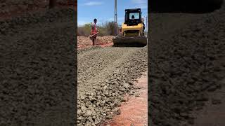 Sub base laying||Spreading Aggregate base course||Road construction #shorts
