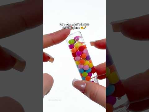 What’s inside this rainbow lip gloss? 🌈🤔 #lipgloss #rainbow #temu #makeupfinds #curiosity #fyp