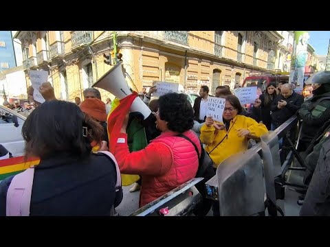 Bolivians gather outside La Paz court ahead of trial against ex-president Anez | AFP